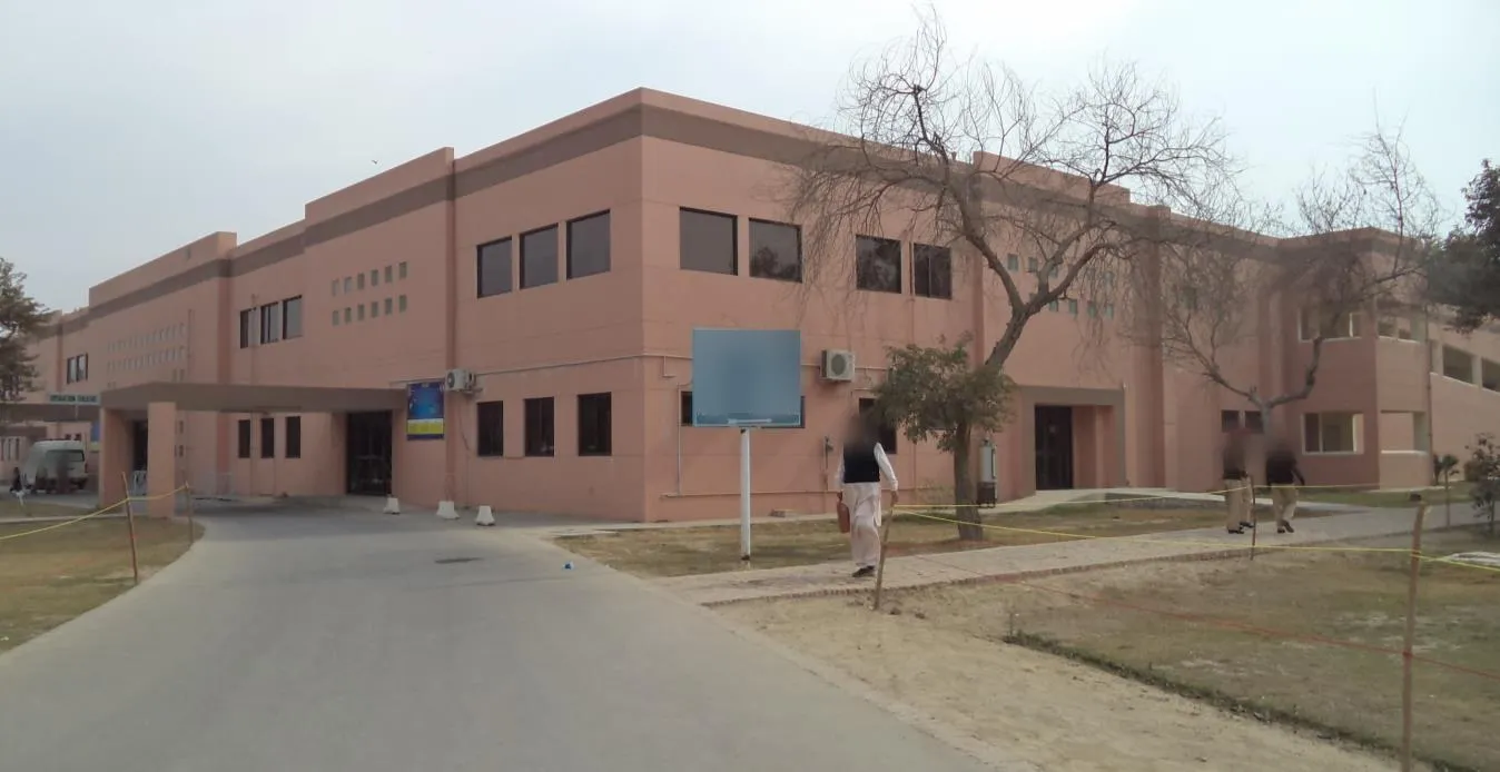 Trauma centre building at CMH Bahawalpur, a two-storey block in pink render with a covered entrance